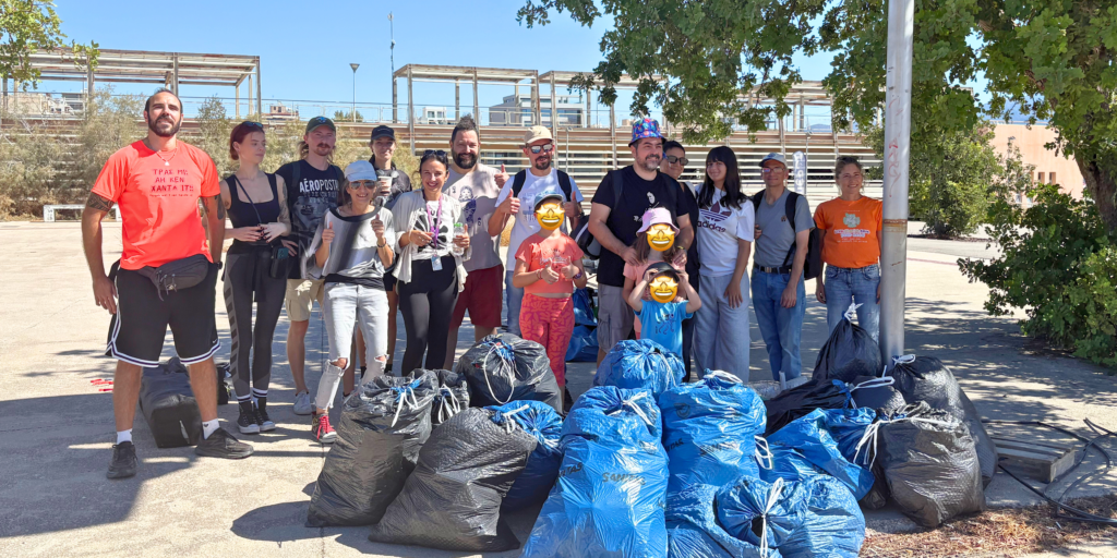 Group Photo of TP volunteers and Save your hood Greece, during clean up action in Marina Kallitheas