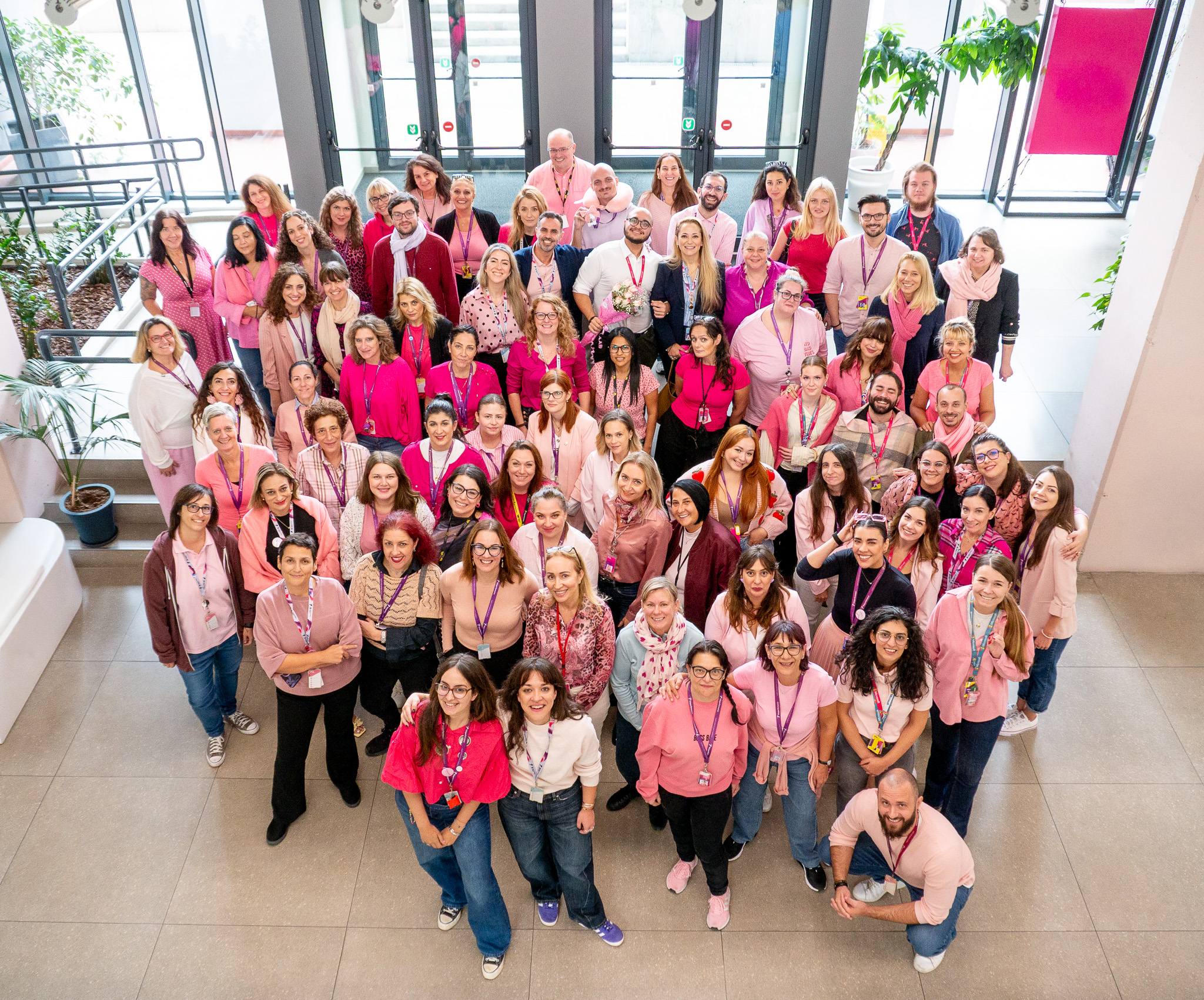 The TP Team in Piraeus Showing up wearing pink, to raise awareness for breast cancer.